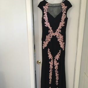 95% polyester, 5% spandex gown